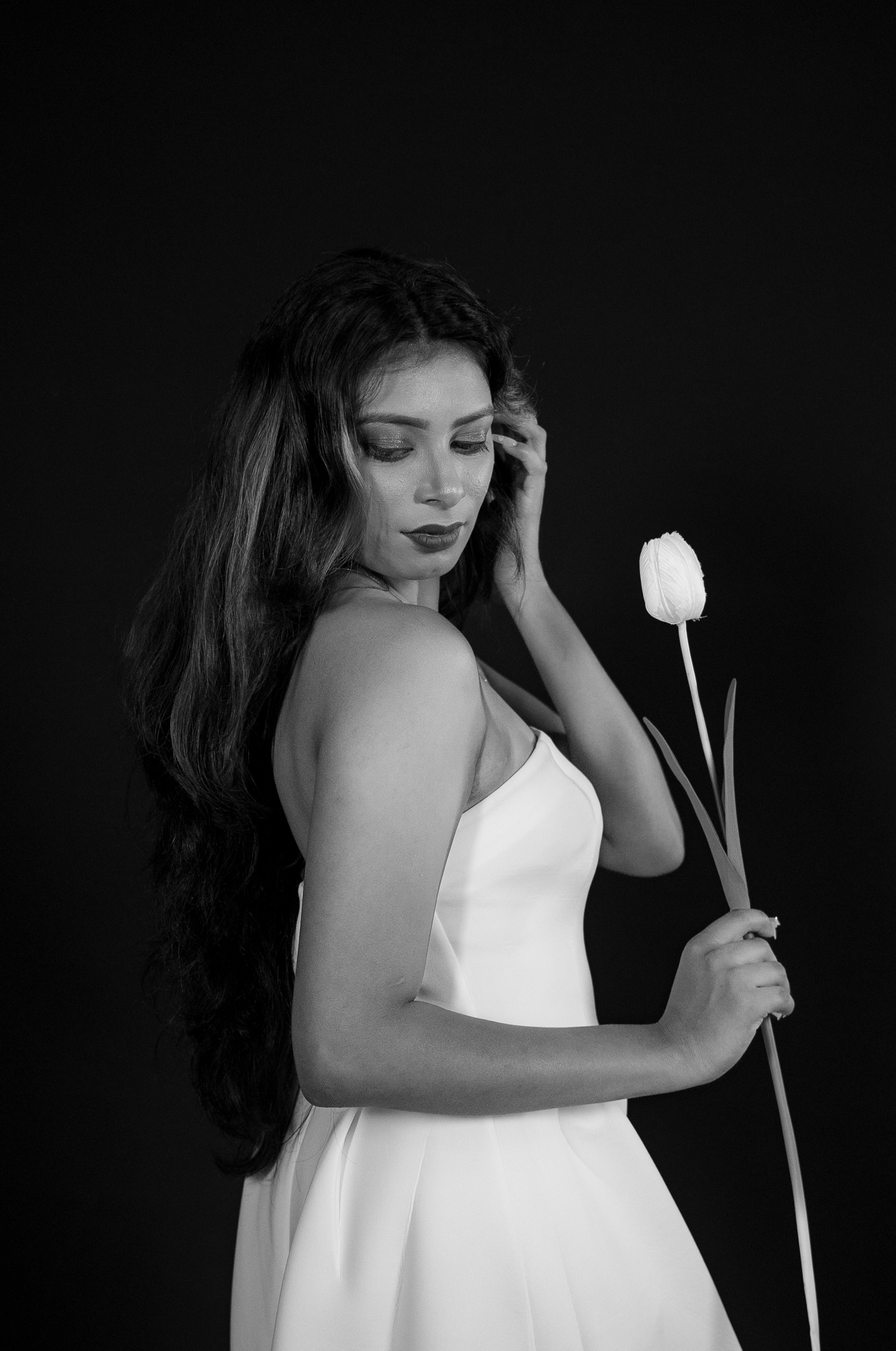 Kawya Erandi monochrome side profile with tulip